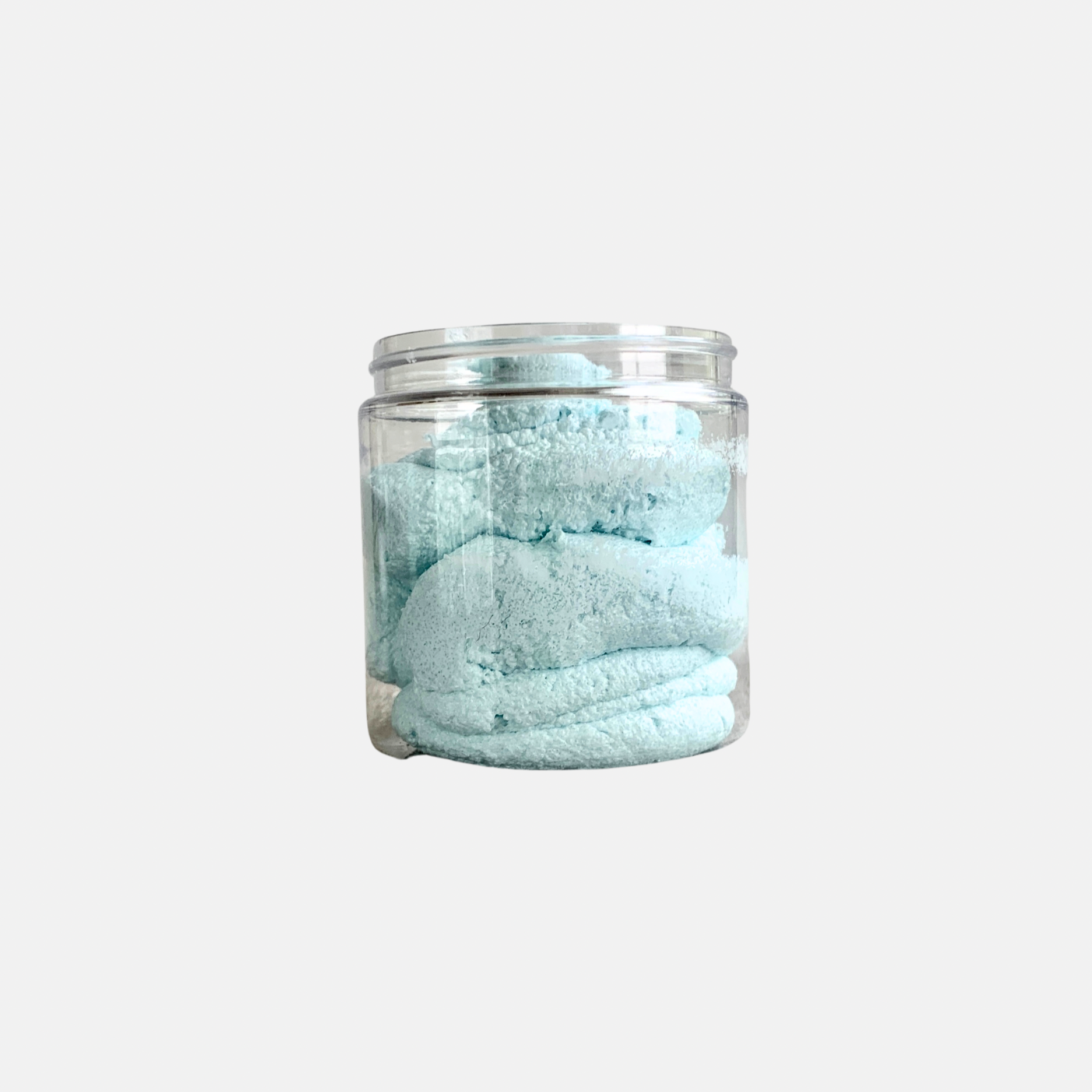 fluffy blue scrub in clear jar