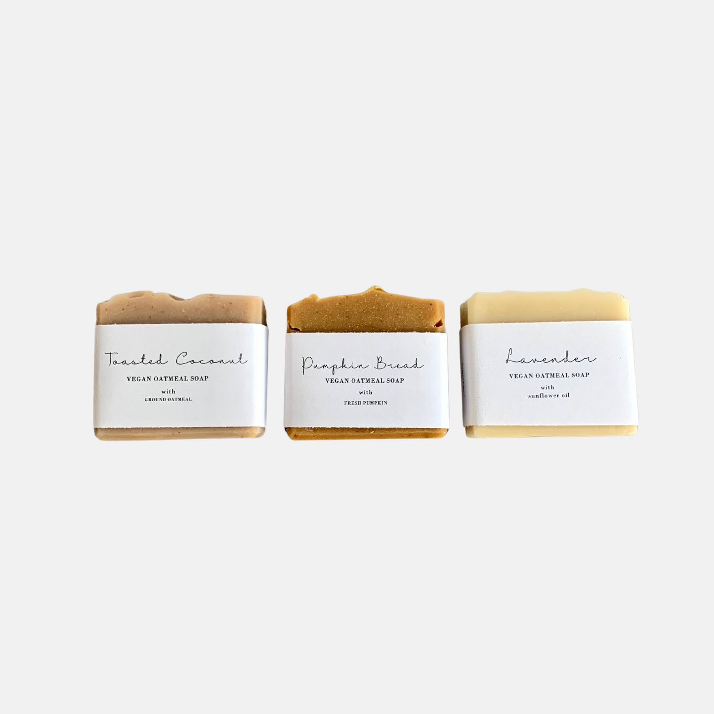 trio of handmade vegan soap with white wrap around label
